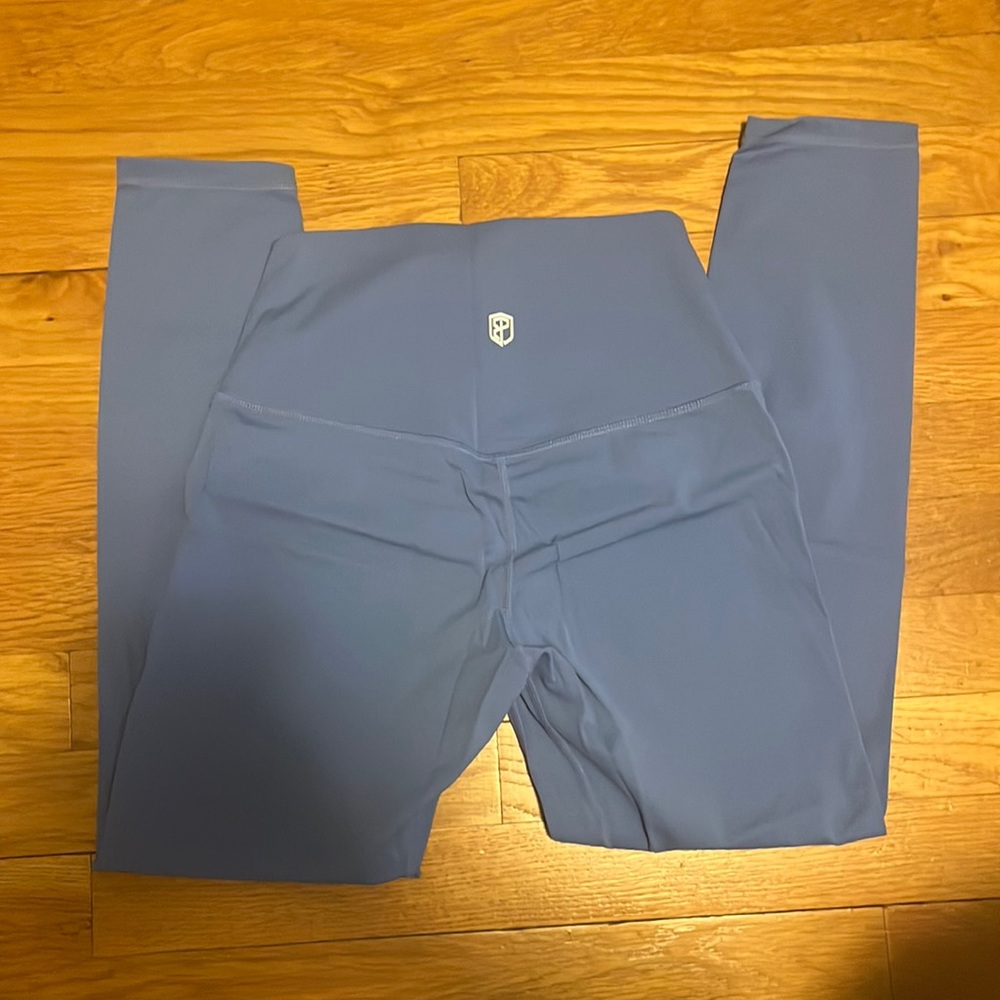 Born primitive blue leggings size Medium.